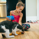Illustration for article titled Family Members Locked In Heated Bidding War To Convince Cat To Sleep In Their Bed